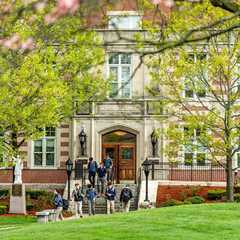Students walking out of the school. Links to Gifts That Protect Your Assets